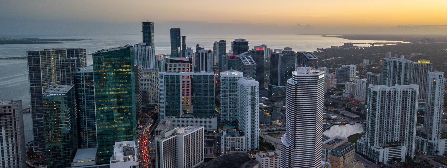 Aerial drone shot of Brickell Miami at dusk